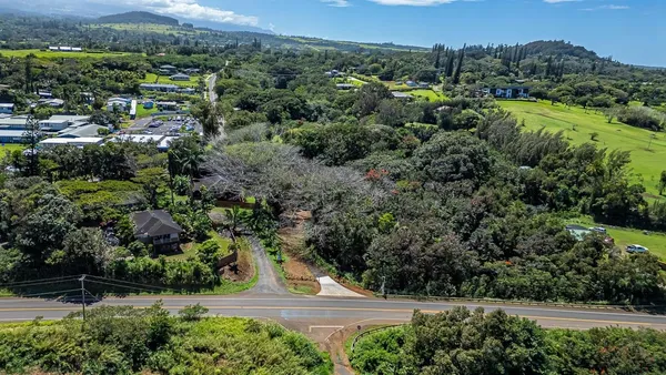 a view of building with green space