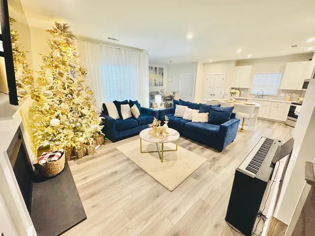 a living room with furniture and a table