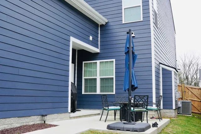 a front view of a house with a patio