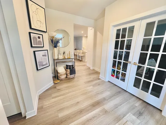 a view of a hardwood floor and workspace