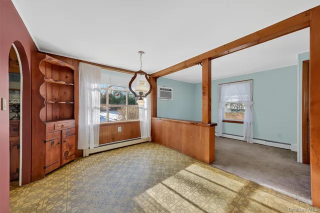 a view of staircase with white walls