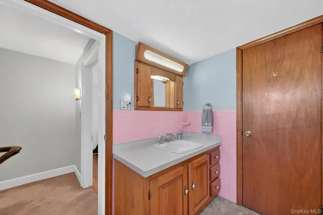 a view of entryway with a front door