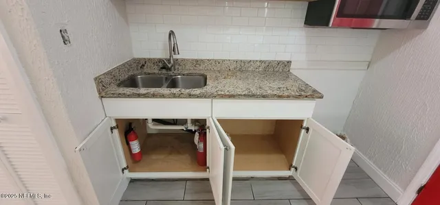 a view of small space with wooden floor