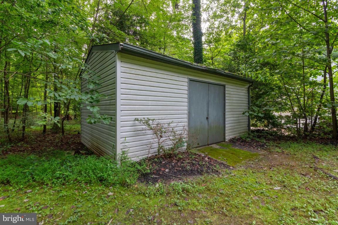 13613 Bethel Road Manassas, VA 20112 - Photo 62 of 66 Out door shed with electric for storing lawn gear