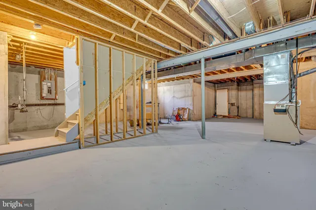 a view of a room with wooden walls
