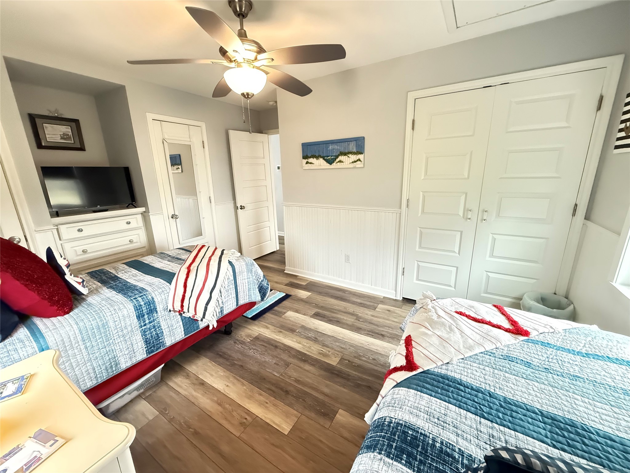 925 Honeysuckle Crystal Beach, TX 77650 - Photo 14 of 20 a bedroom with a bed and a flat screen tv
