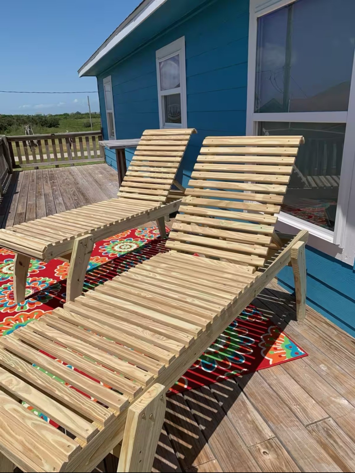 925 Honeysuckle Crystal Beach, TX 77650 - Photo 15 of 20 a balcony view with a sink and wooden floor