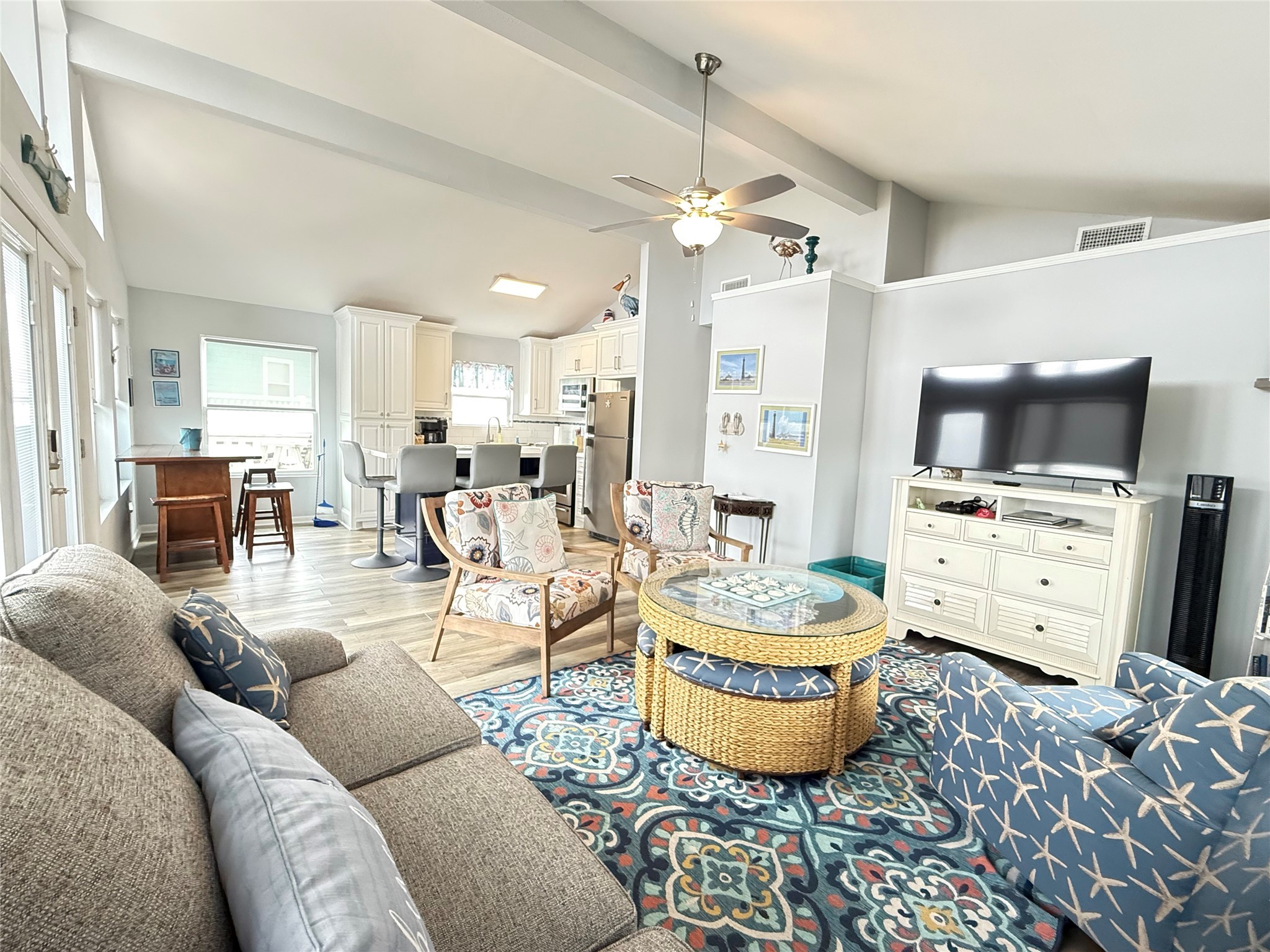 925 Honeysuckle Crystal Beach, TX 77650 - Photo 6 of 20 a living room with furniture and a flat screen tv
