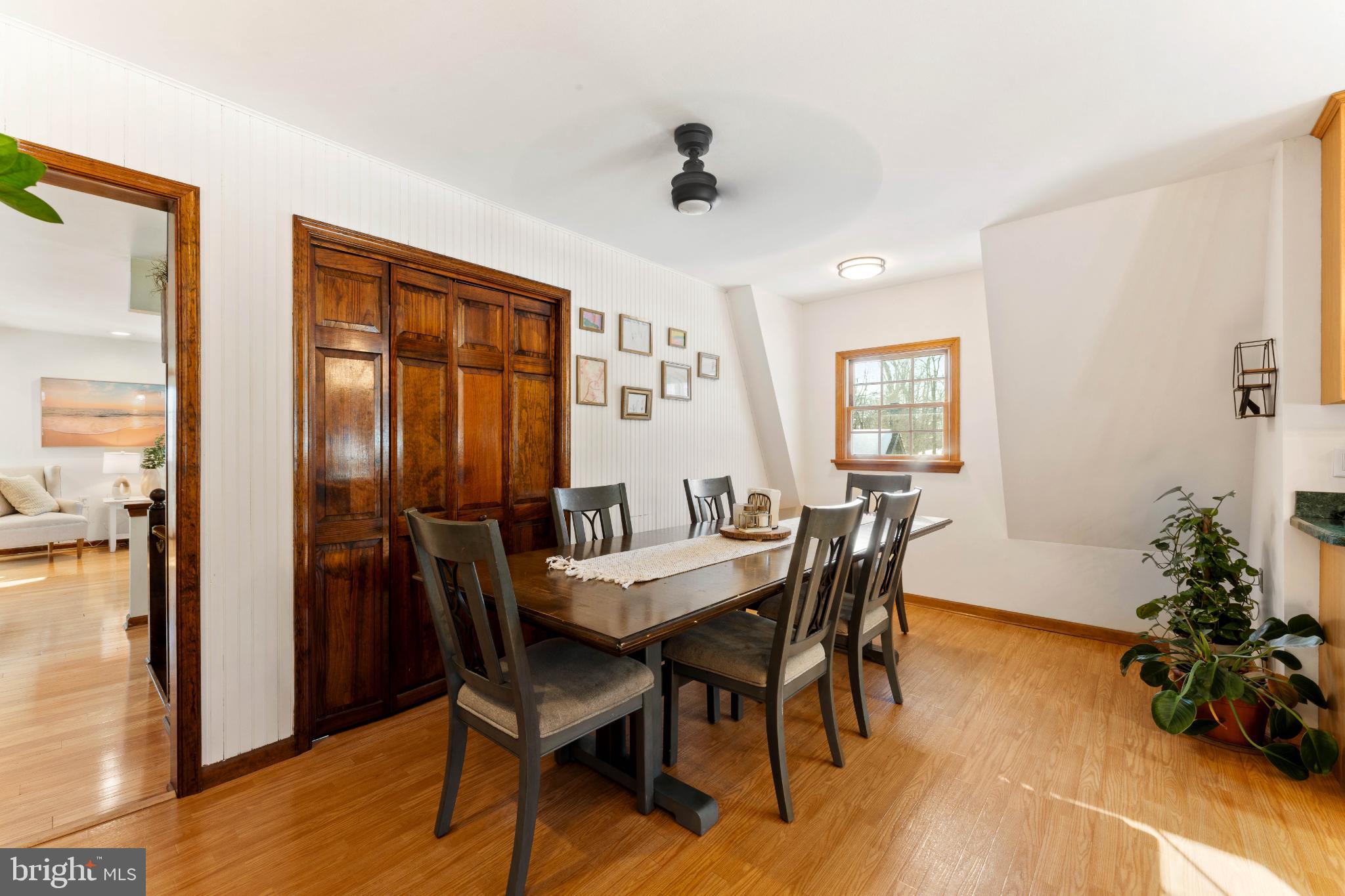 1596 River Road New Hope, PA 18938 - Photo 12 of 39 a view of a dining room with furniture and wooden floor