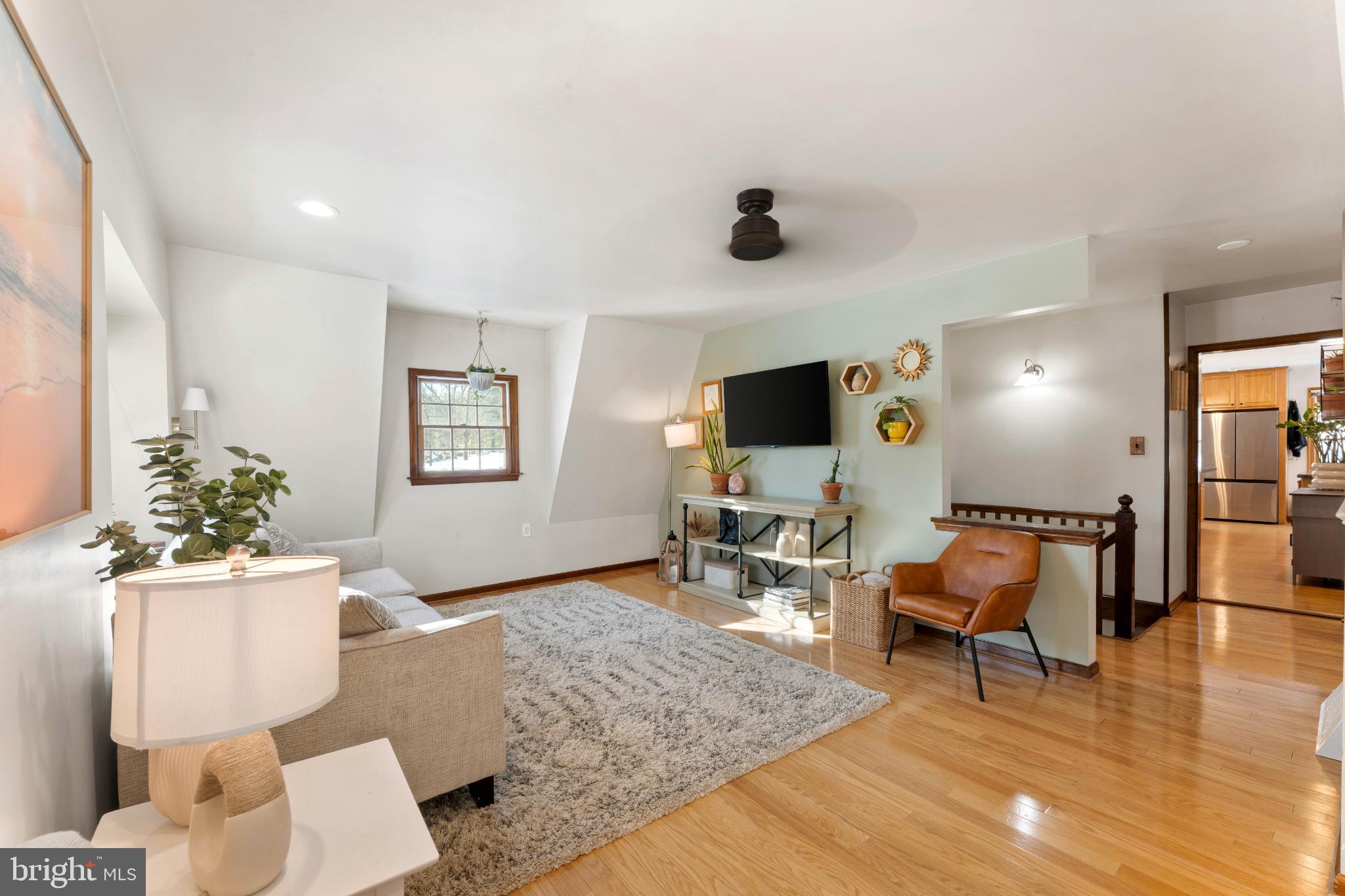 1596 River Road New Hope, PA 18938 - Photo 20 of 39 a living room with furniture and a flat screen tv