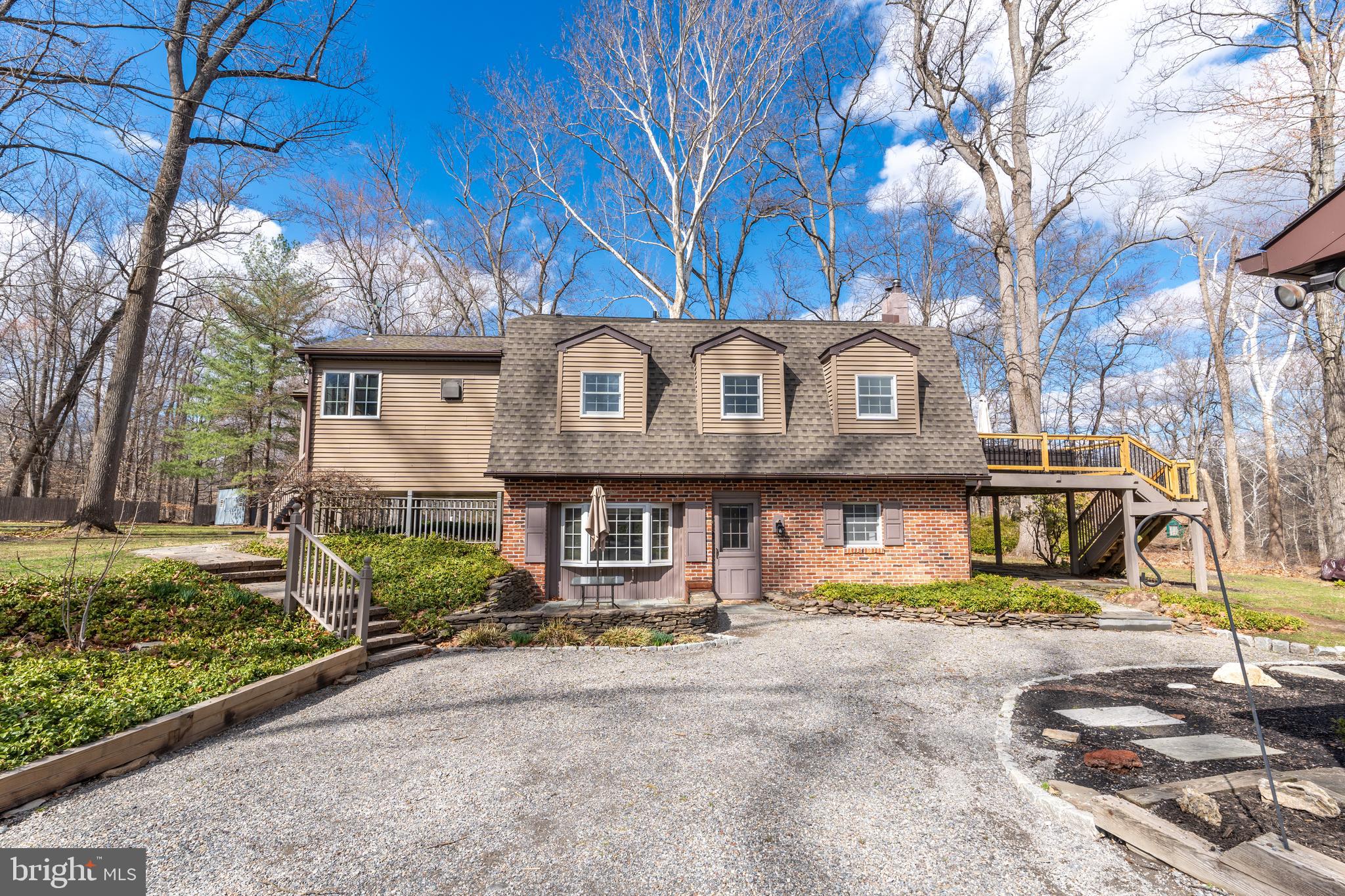 1596 River Road New Hope, PA 18938 - Photo 2 of 39 a front view of a house with a garden