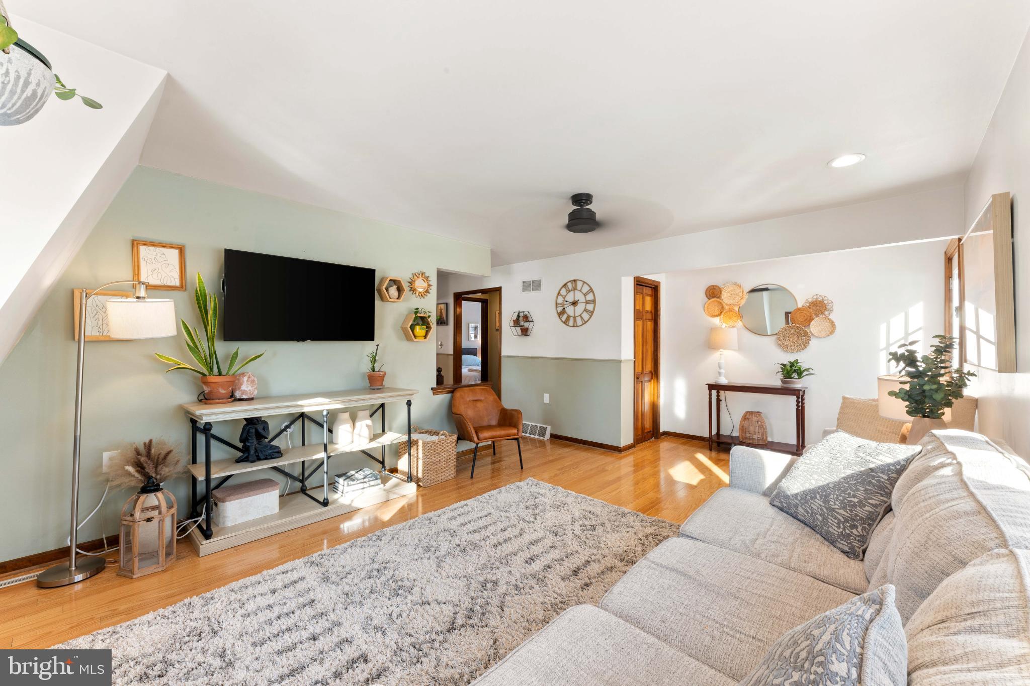 1596 River Road New Hope, PA 18938 - Photo 23 of 39 a living room with furniture and a flat screen tv