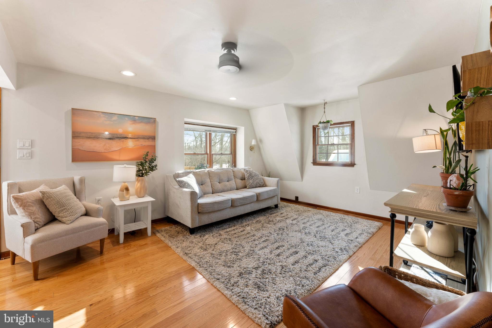 1596 River Road New Hope, PA 18938 - Photo 24 of 39 a living room with furniture and a table