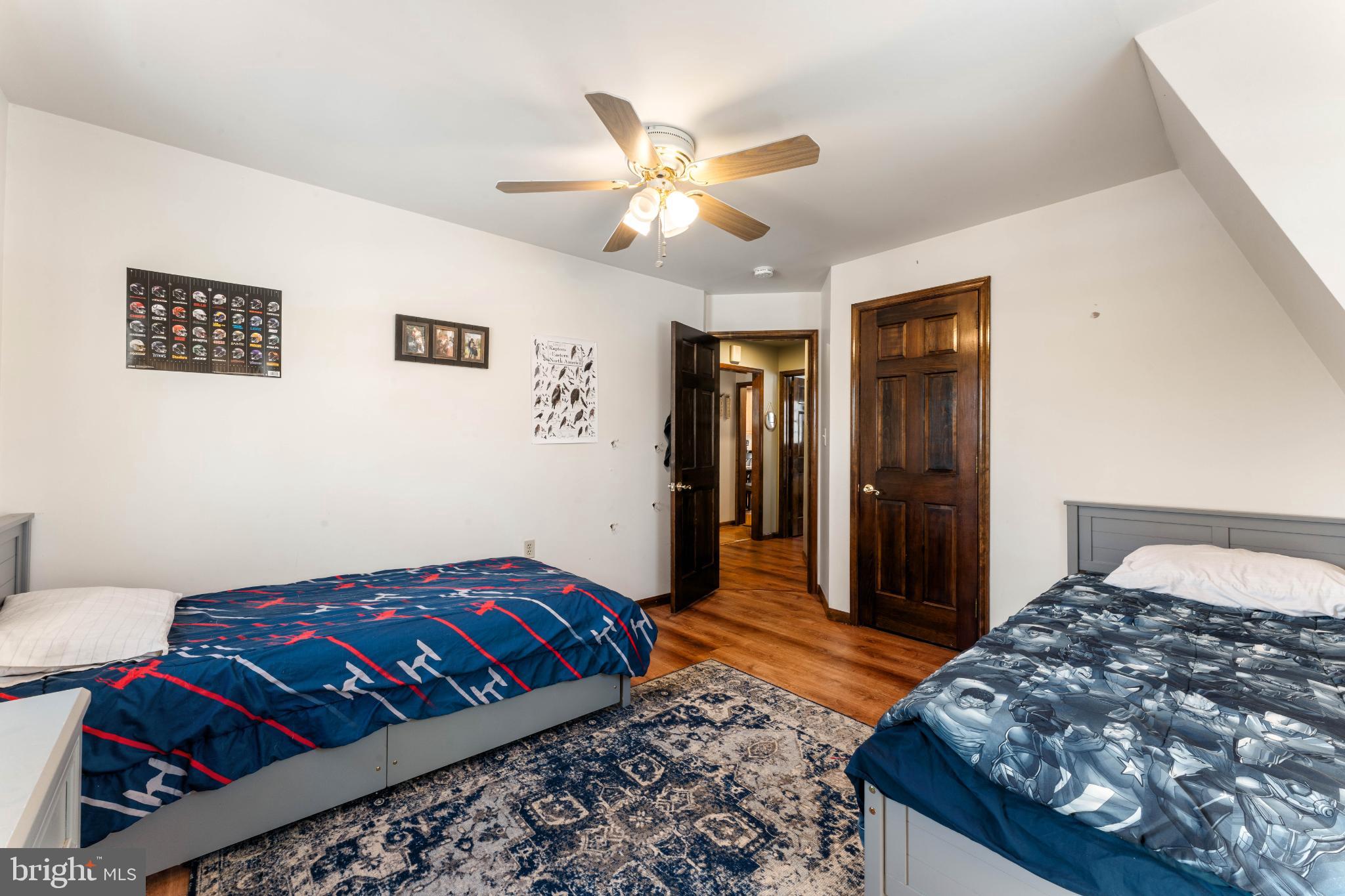 1596 River Road New Hope, PA 18938 - Photo 27 of 36 Cozy twin bedroom with stylish decor.