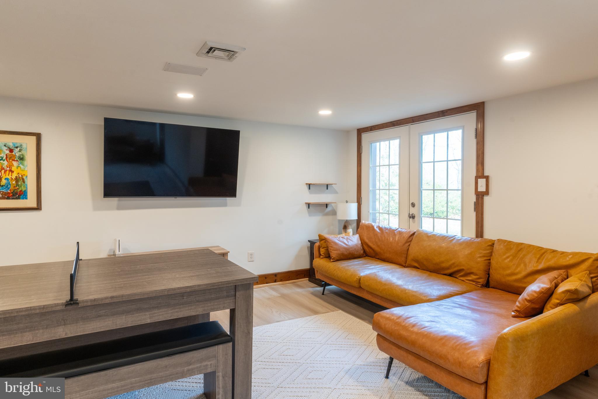 1596 River Road New Hope, PA 18938 - Photo 36 of 39 a living room with furniture and a flat screen tv