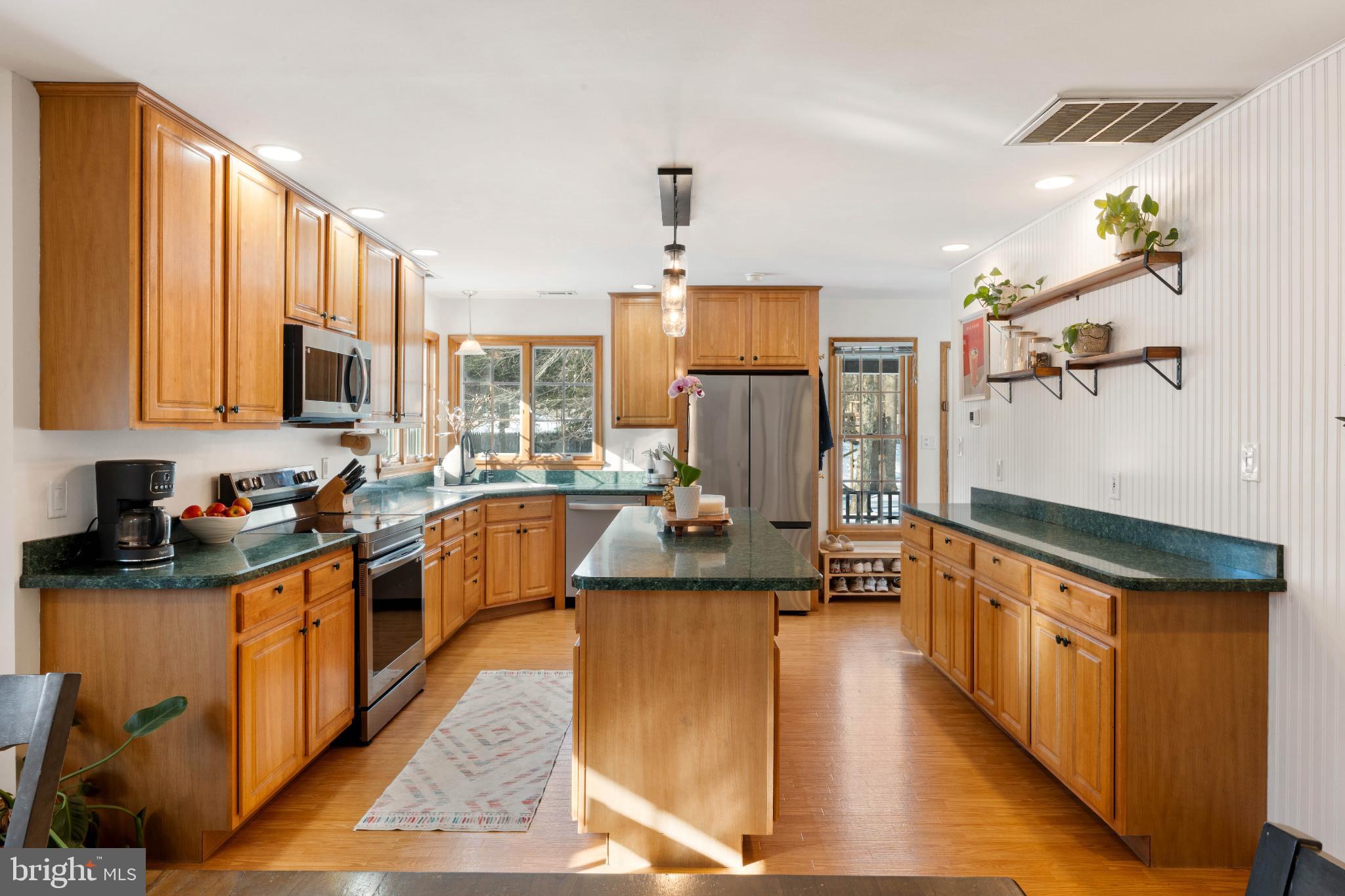 1596 River Road New Hope, PA 18938 - Photo 9 of 39 a kitchen with sink a counter top space and cabinets