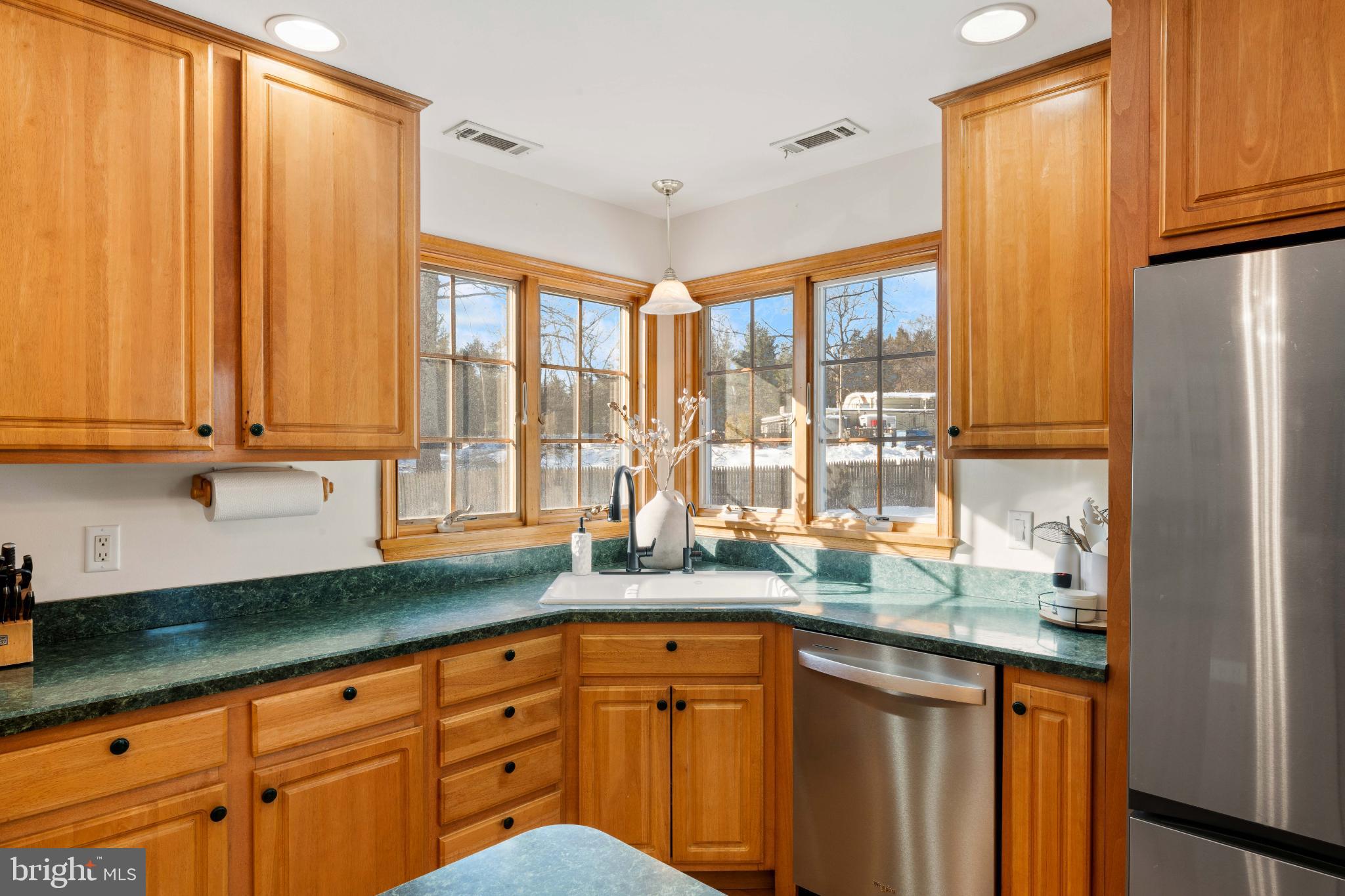 1596 River Road New Hope, PA 18938 - Photo 10 of 39 a kitchen with stainless steel appliances granite countertop a refrigerator and a sink