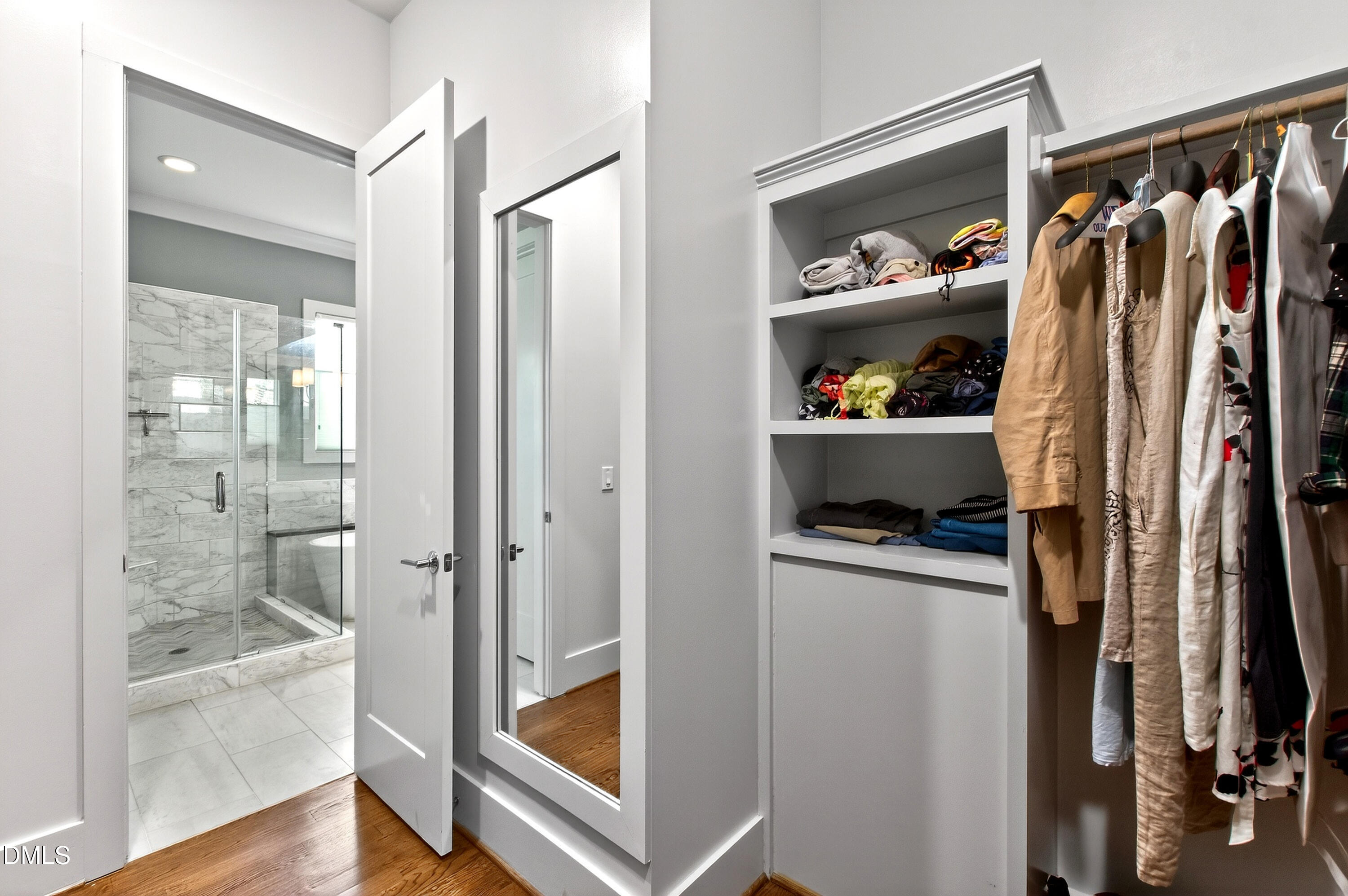 1116 Hymettus Court Raleigh, NC 27607 - Photo 28 of 69 a view of walk in closet with clothes and shoes