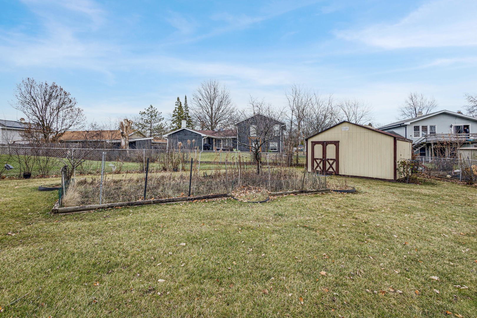 218 Downing Drive Bloomingdale, IL 60108 - Photo 13 of 16 a view of a house with a yard and sitting area