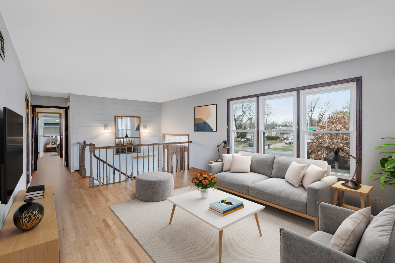 218 Downing Drive Bloomingdale, IL 60108 - Photo 2 of 16 a living room with furniture and a table with wooden floor