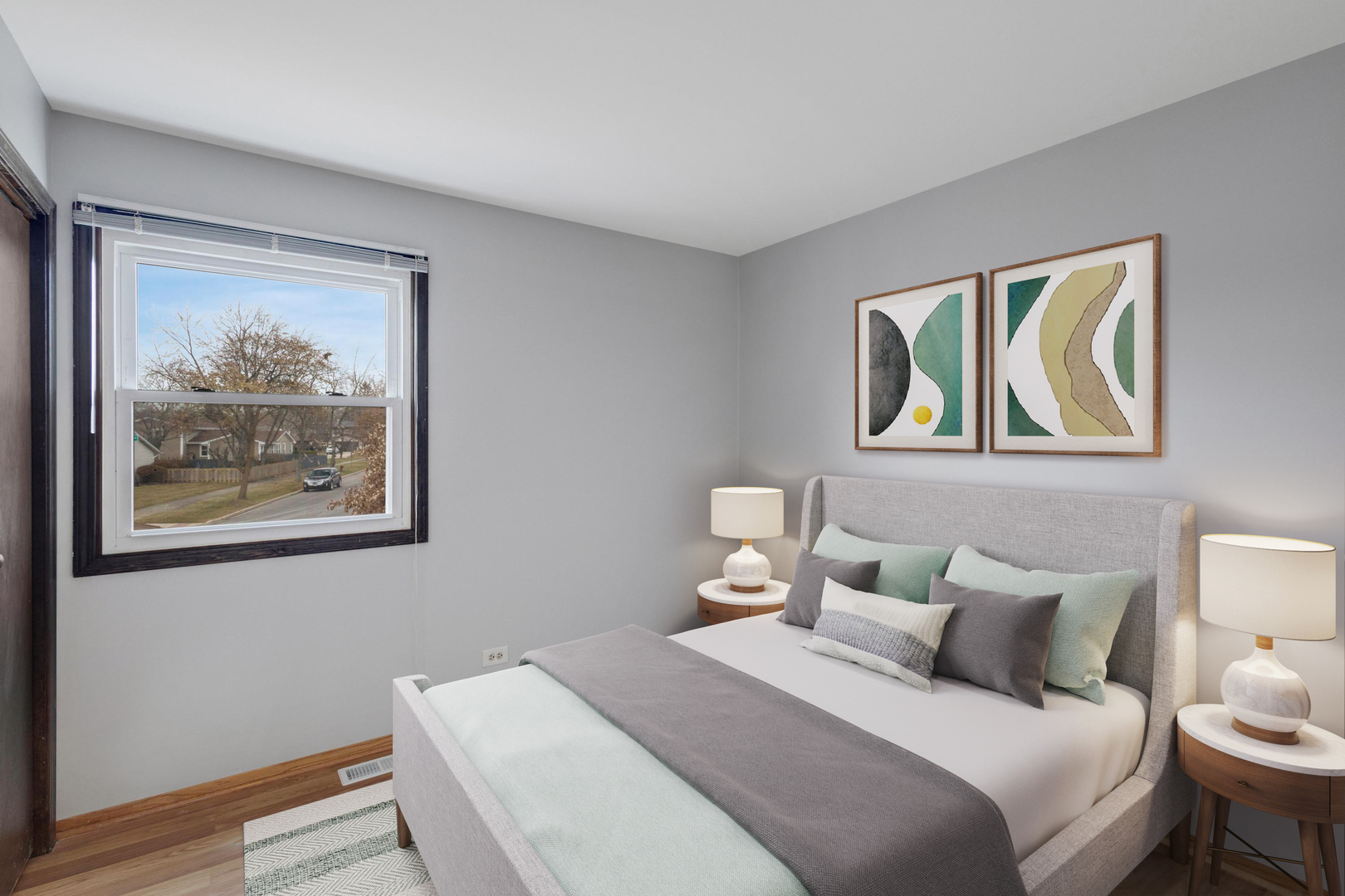 218 Downing Drive Bloomingdale, IL 60108 - Photo 9 of 16 a bedroom with a bed and wooden floor