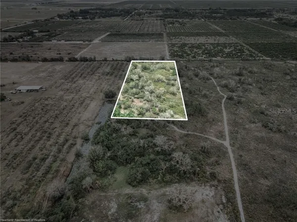a view of mountain with sunset