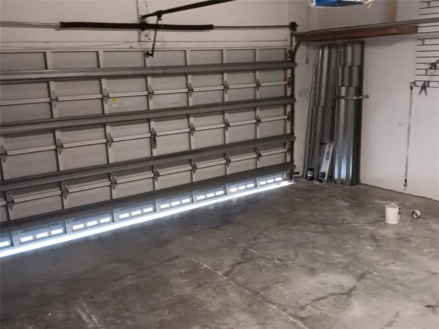 a front view of a house with a yard and entertaining space