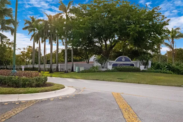 a view of a swimming pool and an outdoor space