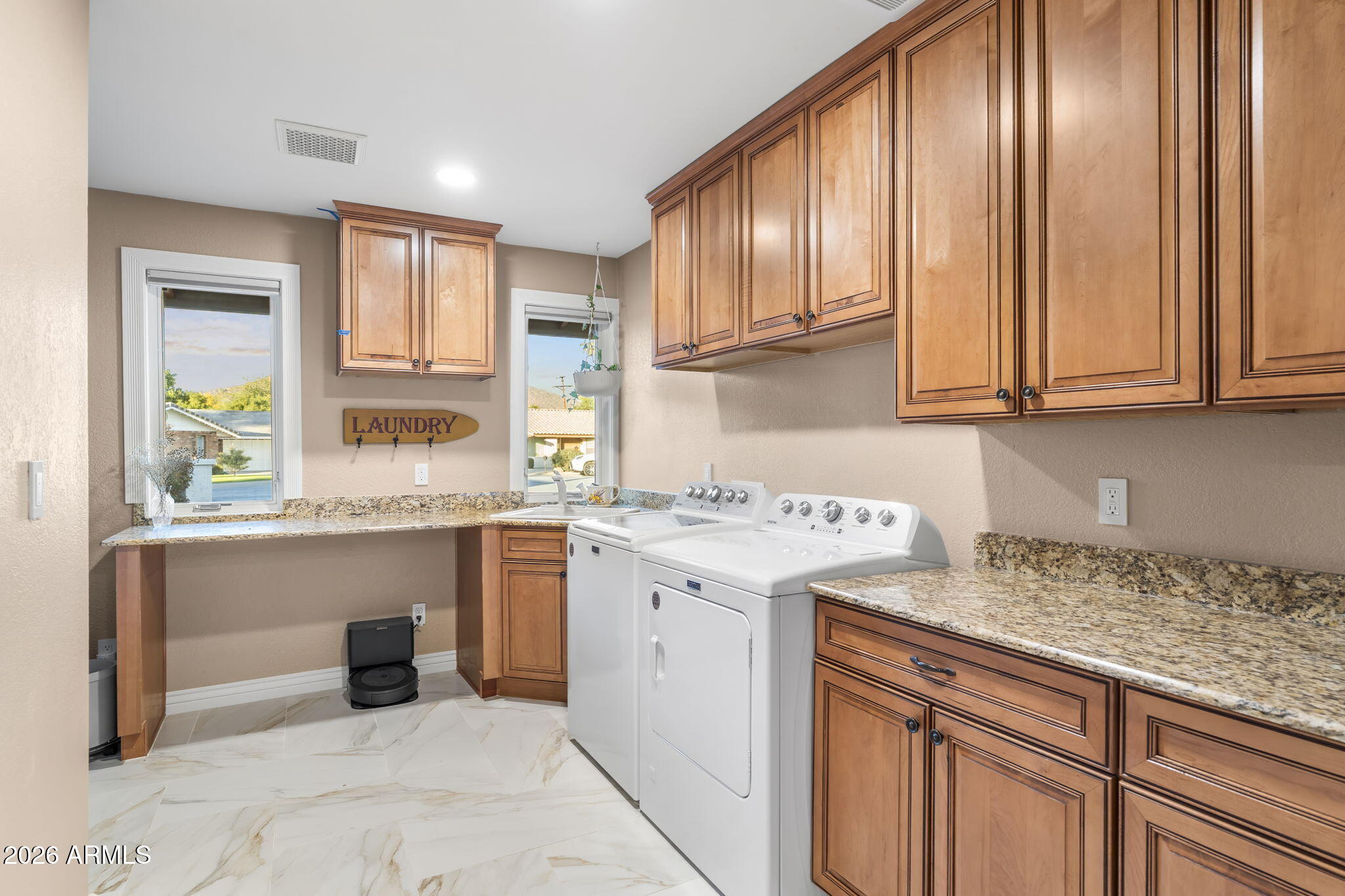 4945 East Cheery Lynn Road Phoenix, AZ 85018 - Photo 18 of 41 a kitchen with a cabinets window and appliances