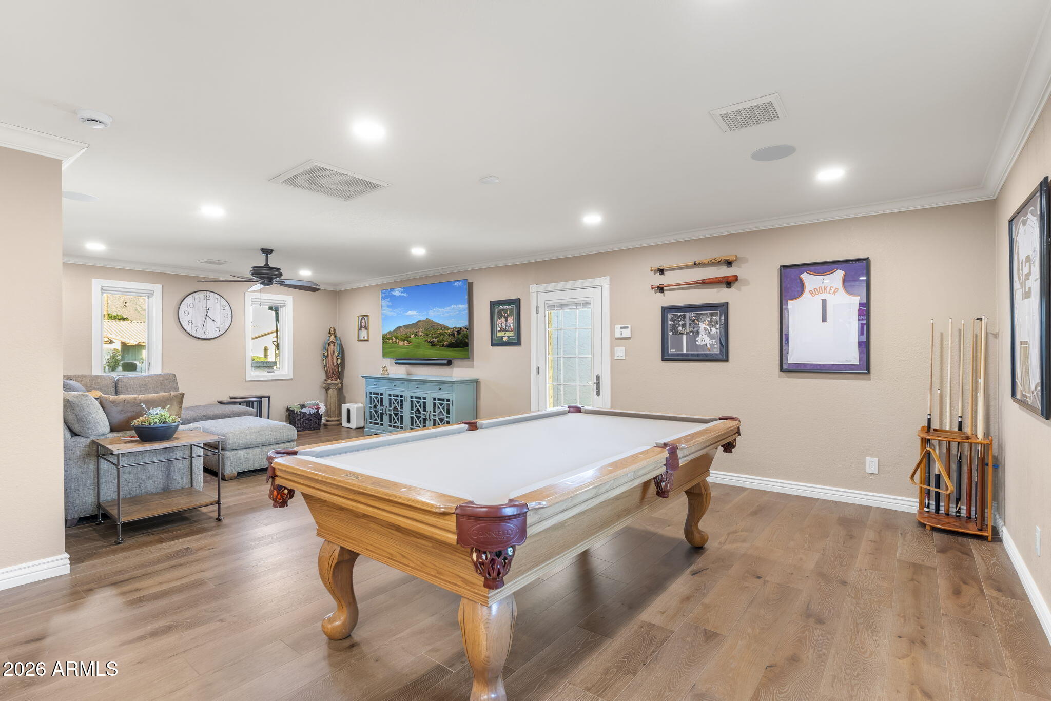 4945 East Cheery Lynn Road Phoenix, AZ 85018 - Photo 22 of 41 a living room with furniture pool table and a large window