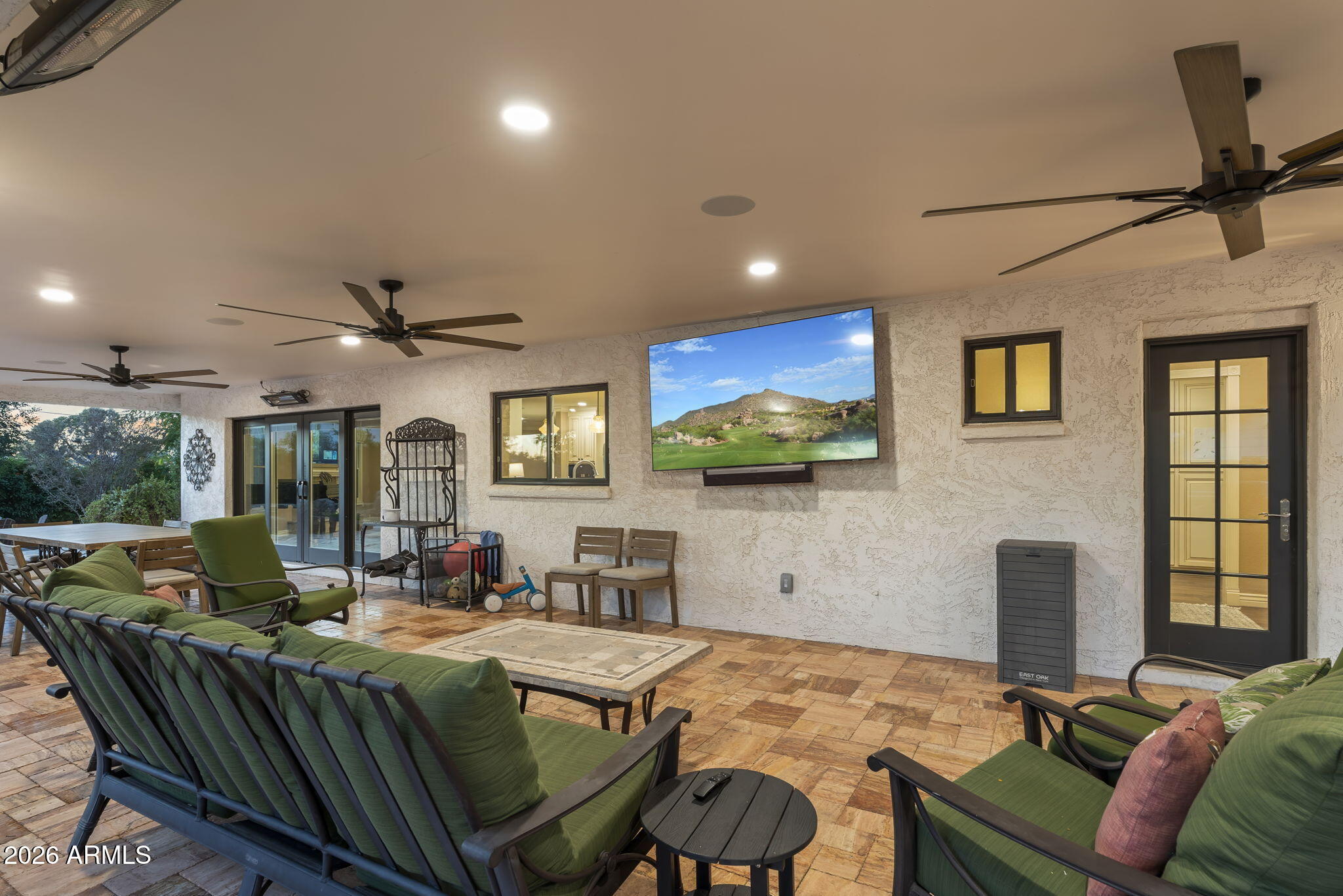 4945 East Cheery Lynn Road Phoenix, AZ 85018 - Photo 29 of 41 a living room with furniture and a flat screen tv