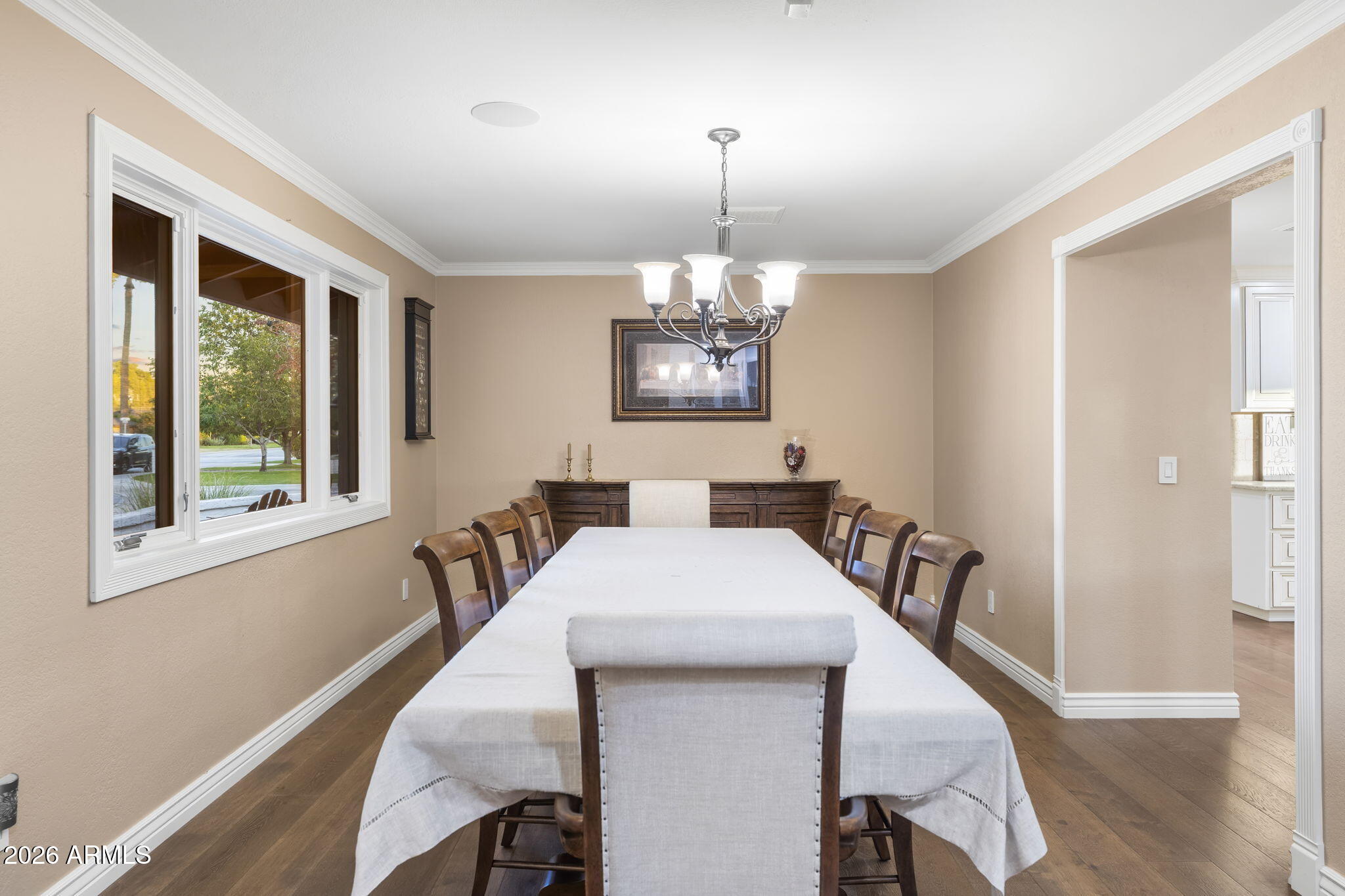 4945 East Cheery Lynn Road Phoenix, AZ 85018 - Photo 3 of 41 a view of a dining room with furniture window and wooden floor