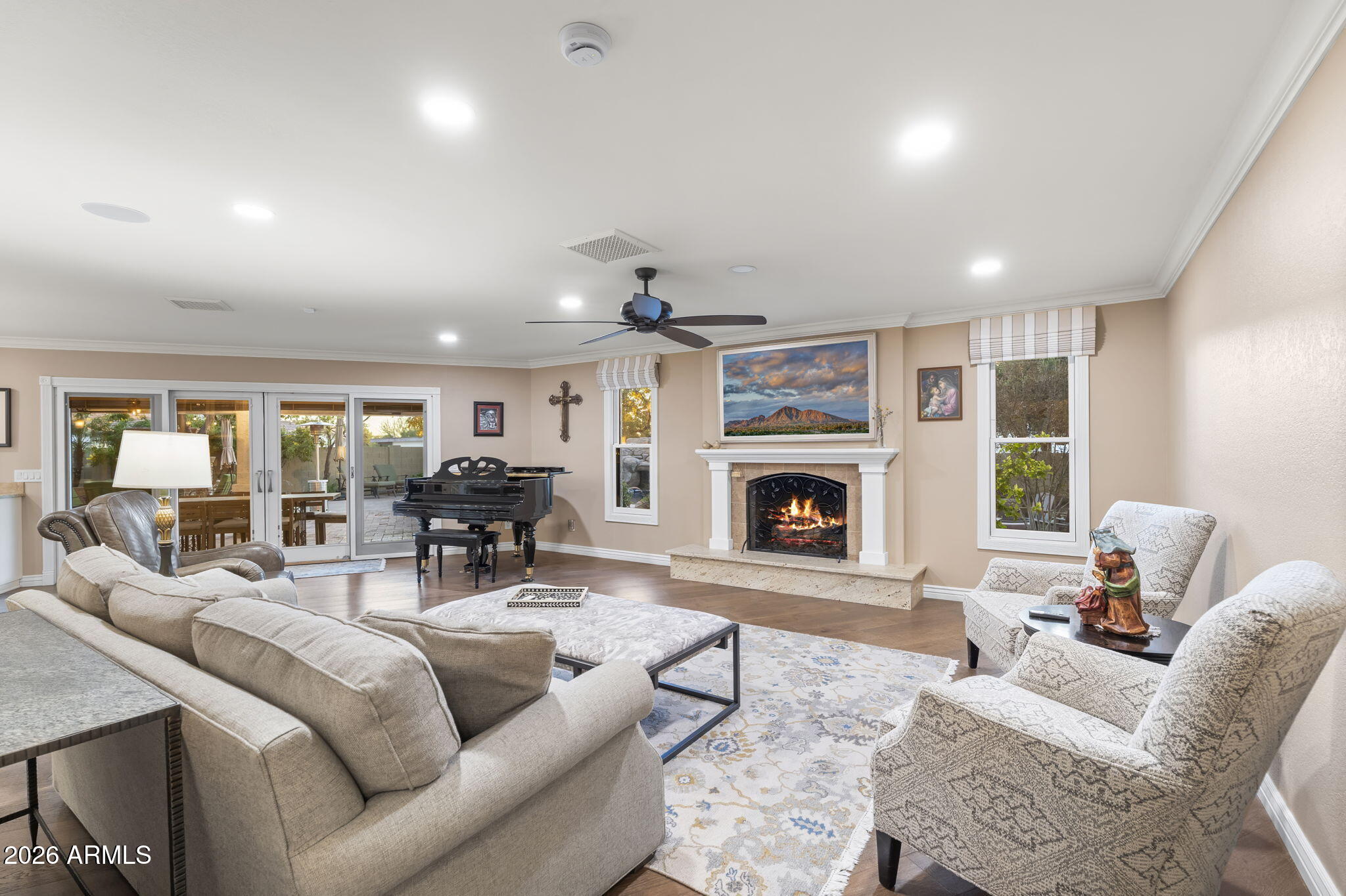 4945 East Cheery Lynn Road Phoenix, AZ 85018 - Photo 7 of 41 a living room with furniture fireplace and a large window
