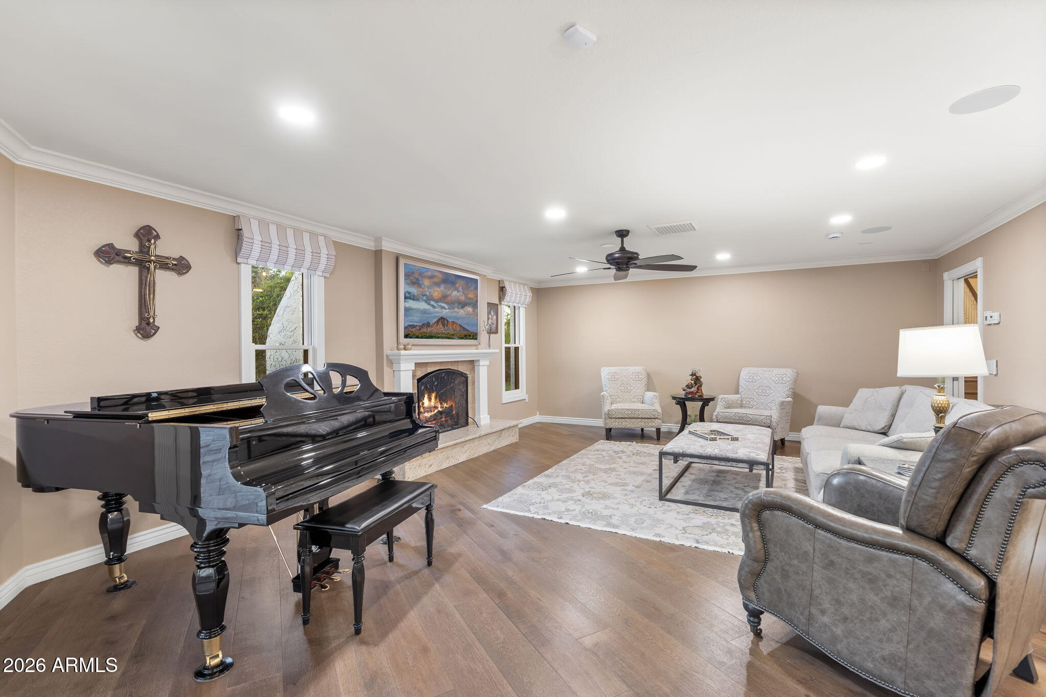 4945 East Cheery Lynn Road Phoenix, AZ 85018 - Photo 8 of 41 a living room with furniture a piano and a fireplace