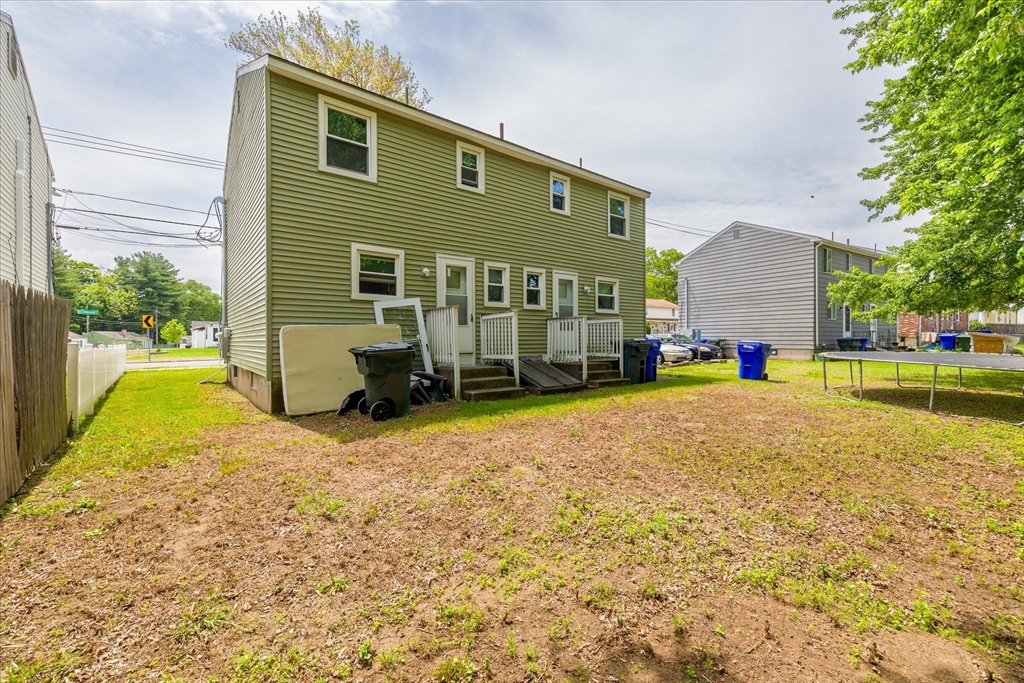 193-195 Nottingham Street Springfield, MA 01104 - Photo 2 of 24 a view of a house with backyard and sitting area