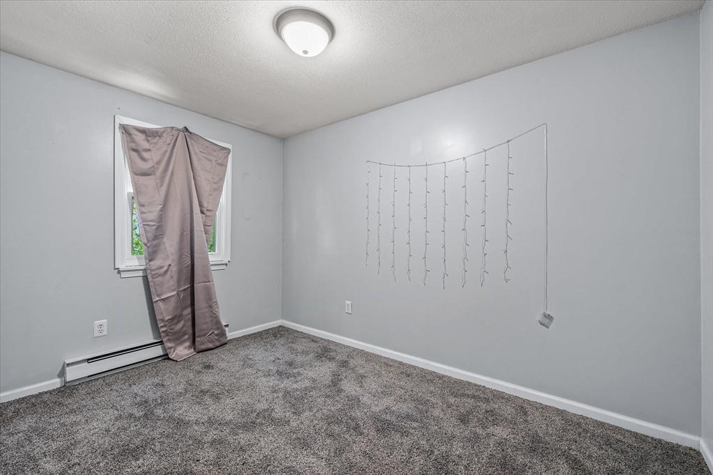 193-195 Nottingham Street Springfield, MA 01104 - Photo 10 of 24 a view of an empty room