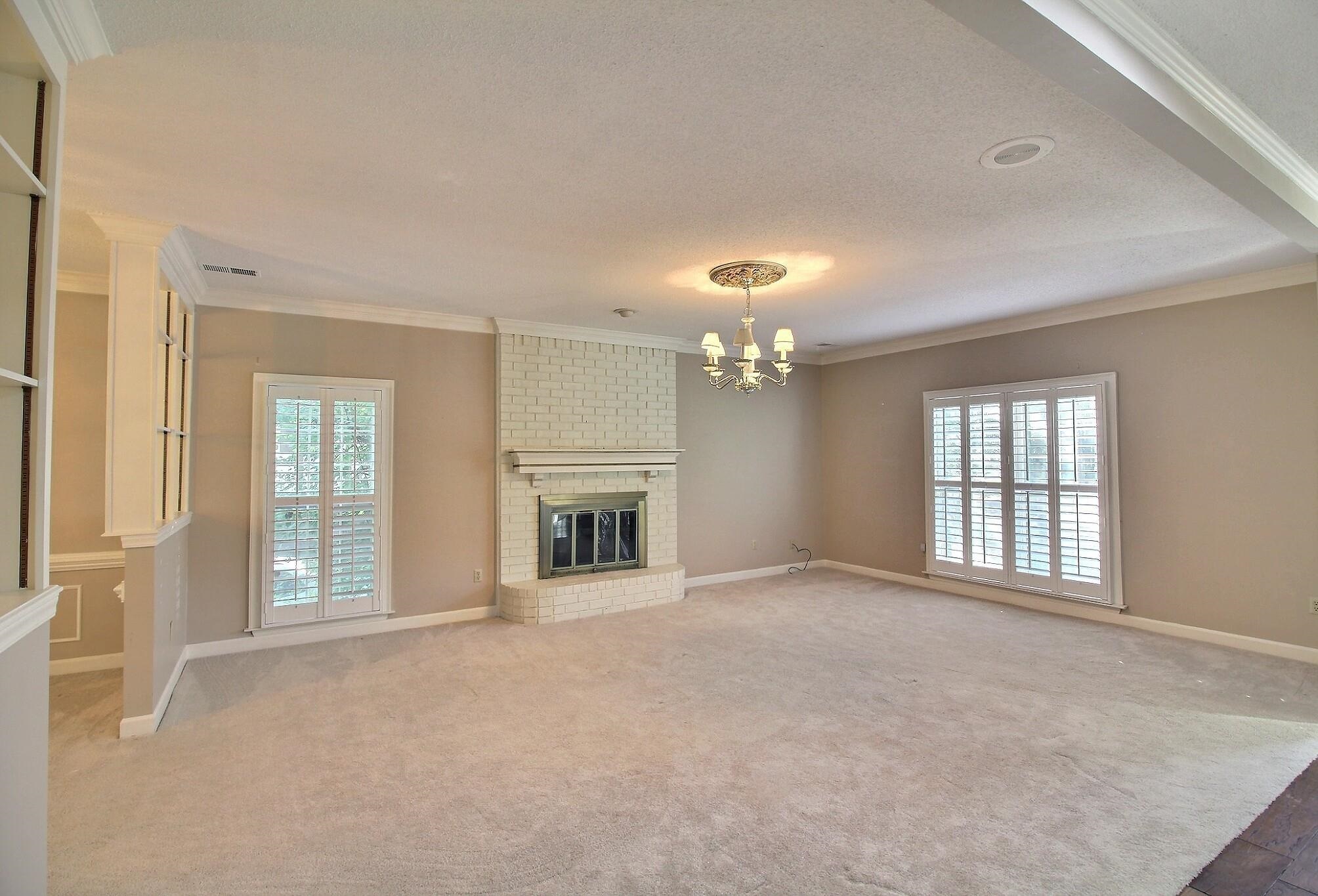 8222 Dogwood Road Germantown, TN 38139 - Photo 15 of 40 an empty room with windows and fireplace
