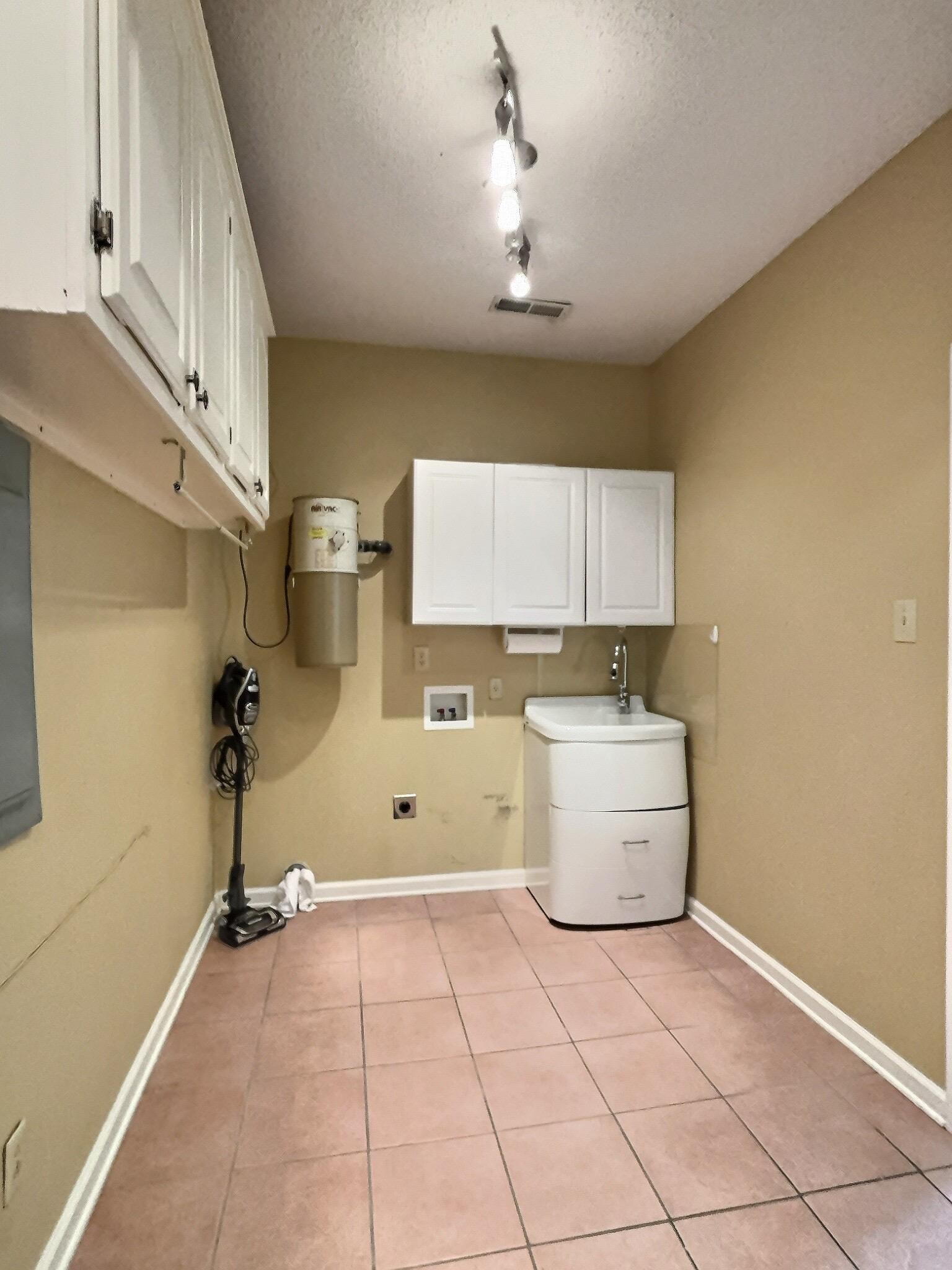 8222 Dogwood Road Germantown, TN 38139 - Photo 18 of 40 a view of a kitchen with a sink and cabinets