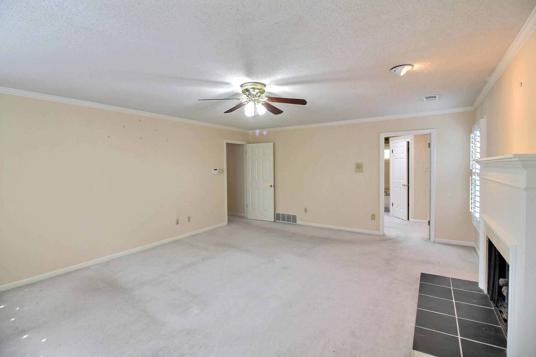 8222 Dogwood Road Germantown, TN 38139 - Photo 24 of 40 a view of empty room with a fireplace