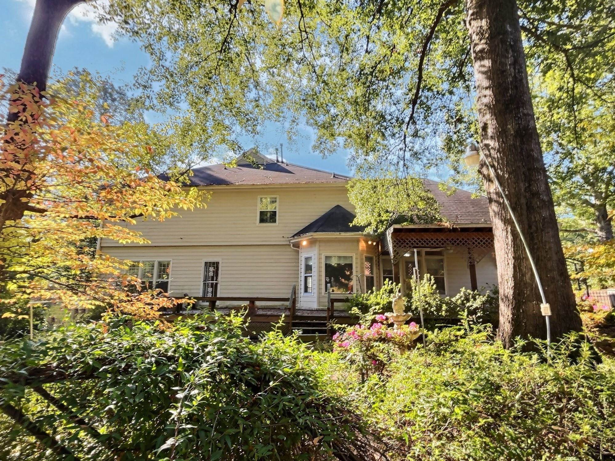 8222 Dogwood Road Germantown, TN 38139 - Photo 36 of 40 a front view of a house with garden