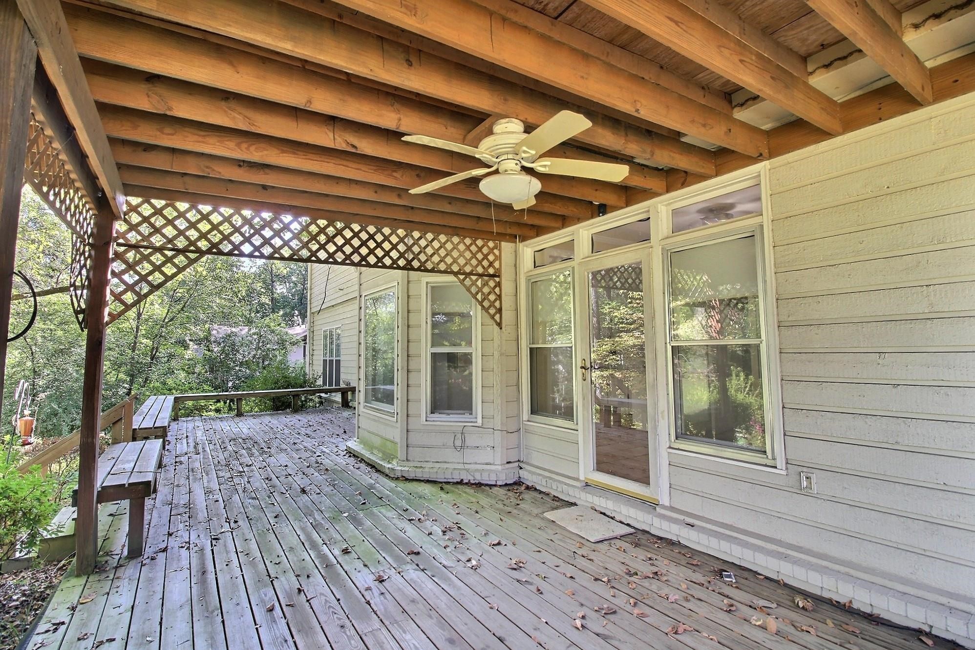 8222 Dogwood Road Germantown, TN 38139 - Photo 37 of 40 a view of a porch with wooden floor