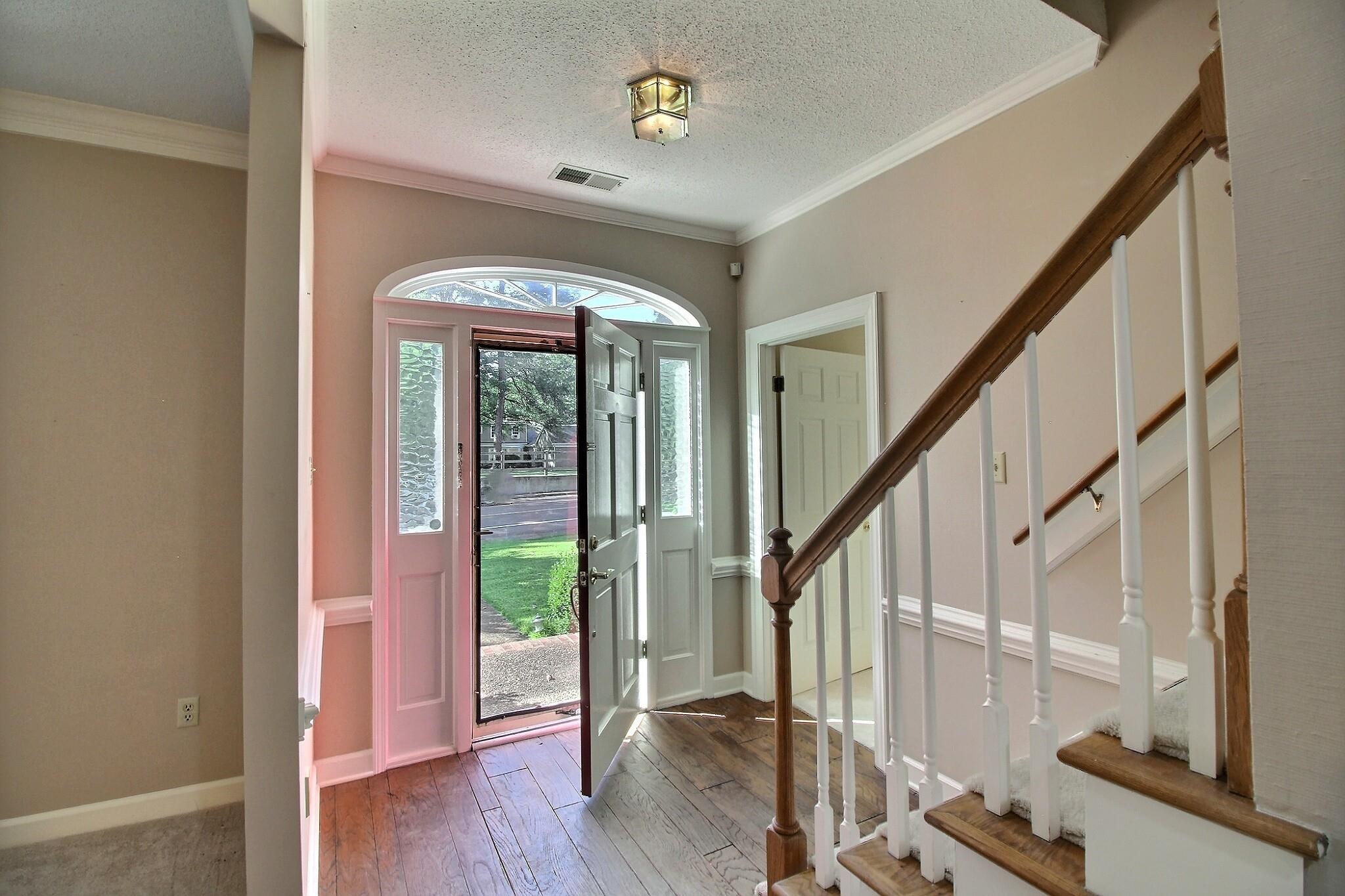8222 Dogwood Road Germantown, TN 38139 - Photo 5 of 40 a view of an entryway with wooden floor