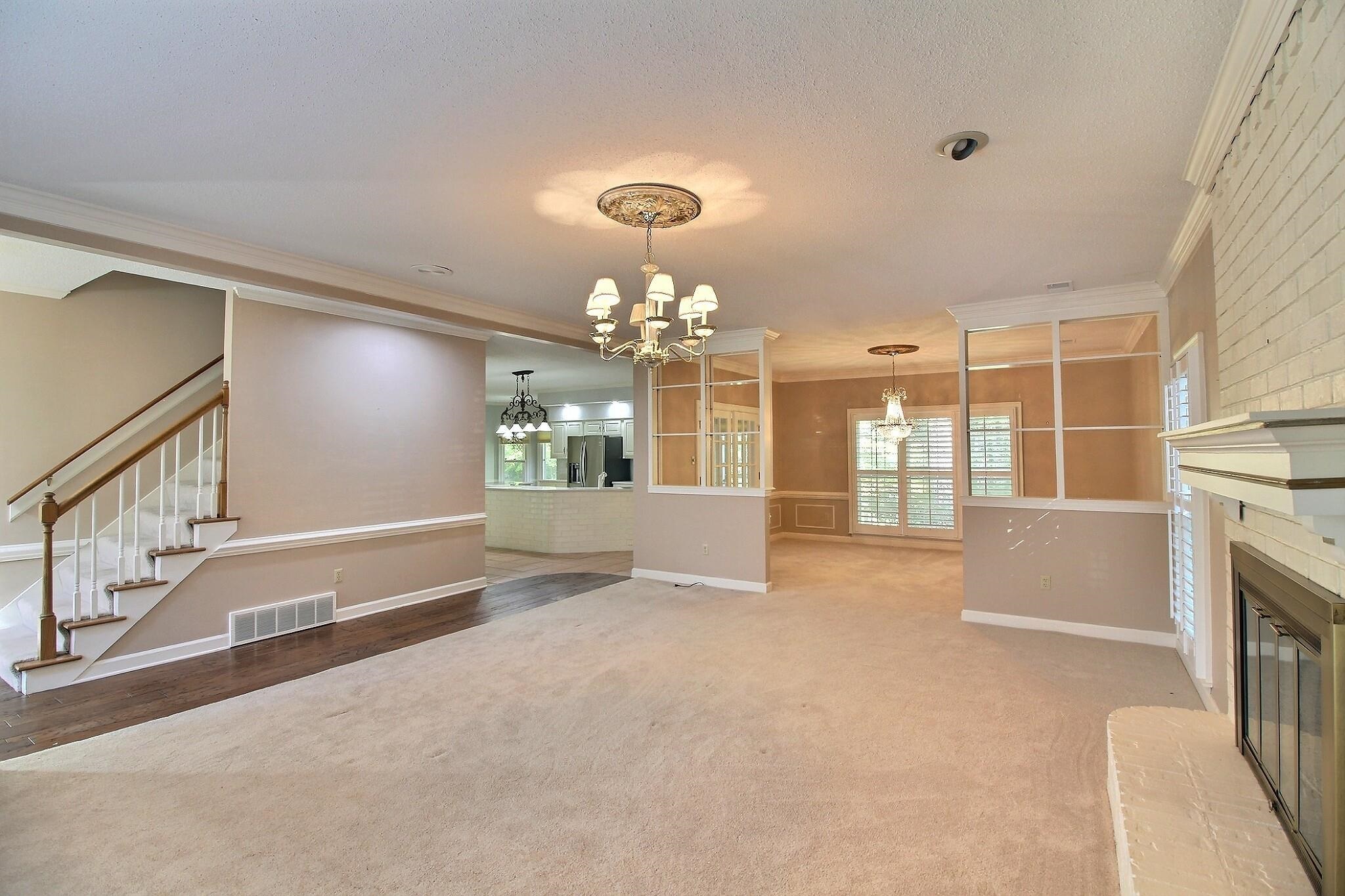 8222 Dogwood Road Germantown, TN 38139 - Photo 6 of 40 a view of a hallway with an entryway and chandelier