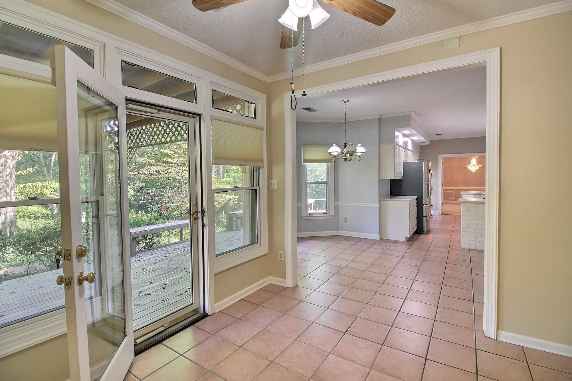 8222 Dogwood Road Germantown, TN 38139 - Photo 10 of 40 a view of a hallway with a chandelier