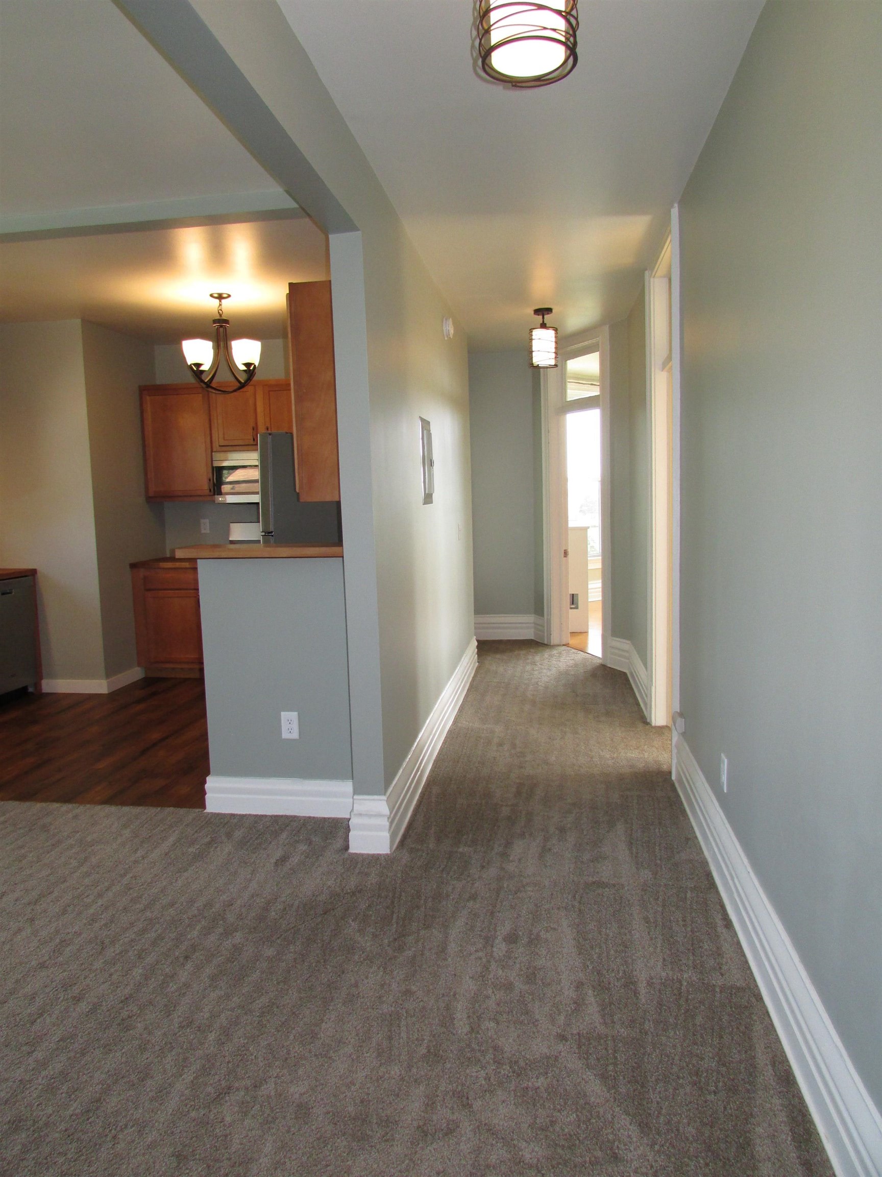 1212 East 2nd Street Superior, WI 54880 - Photo 7 of 19 Hall with dark colored carpet