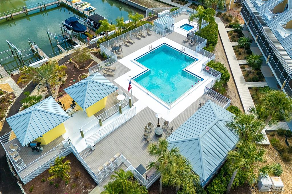 2424 Placida Road, Unit C101 Englewood, FL 34224 - Photo 47 of 65 an aerial view of a house with a garden
