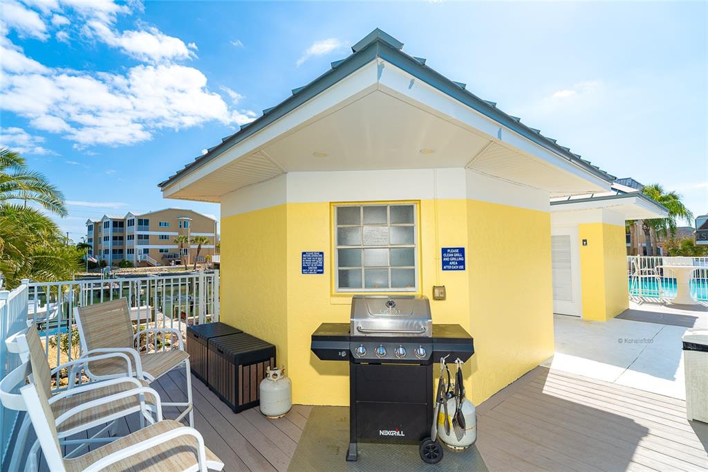 2424 Placida Road, Unit C101 Englewood, FL 34224 - Photo 53 of 65 a view of house with outdoor seating space