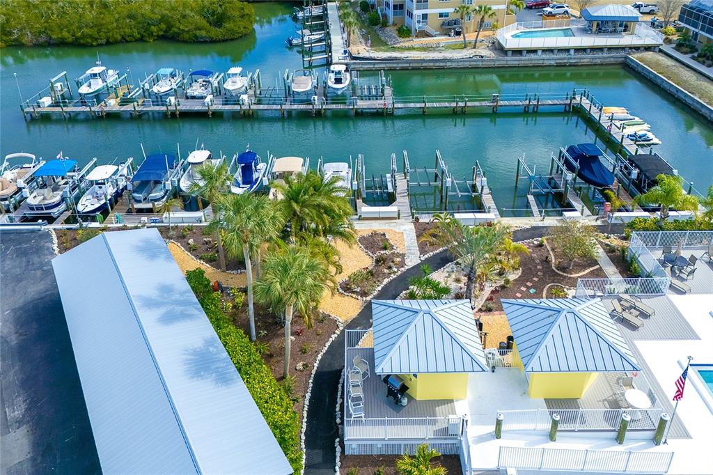 2424 Placida Road, Unit C101 Englewood, FL 34224 - Photo 57 of 65 an aerial view of a house with swimming pool and outdoor seating