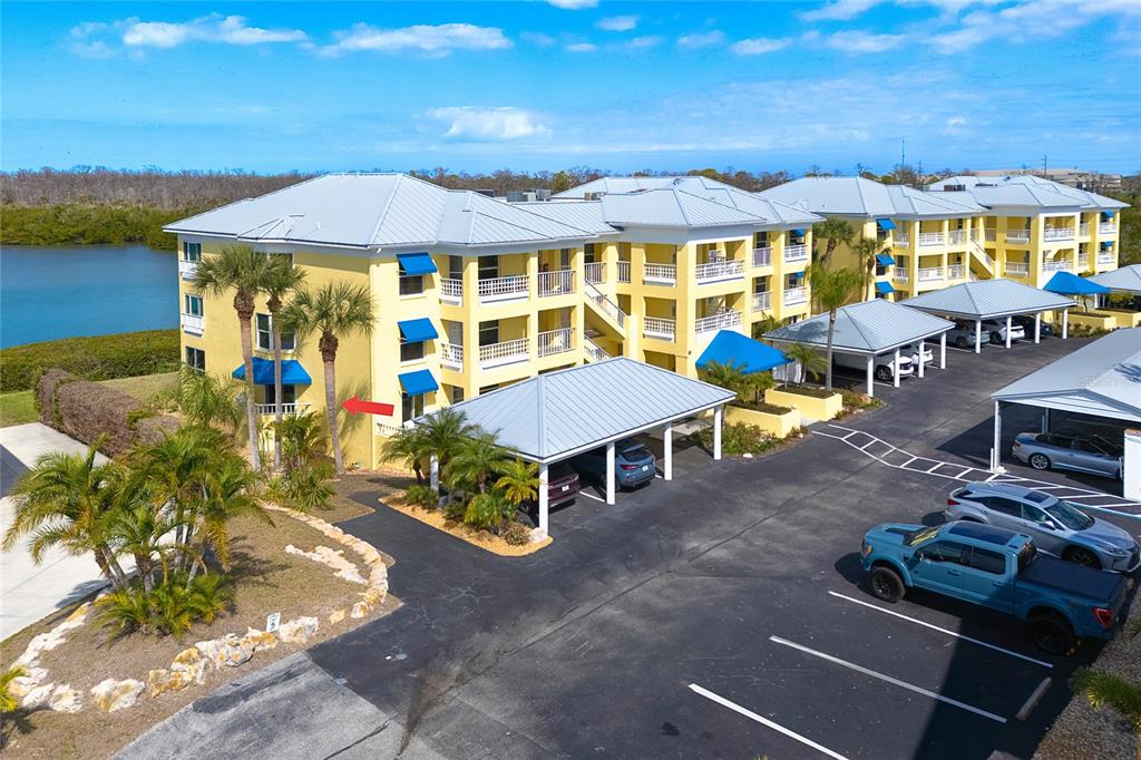 2424 Placida Road, Unit C101 Englewood, FL 34224 - Photo 60 of 65 an outdoor space with furniture