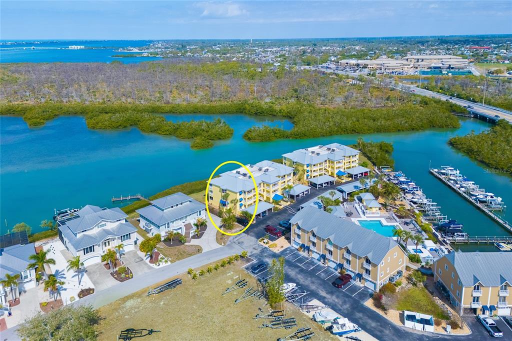 2424 Placida Road, Unit C101 Englewood, FL 34224 - Photo 62 of 65 an aerial view of ocean residential house with outdoor space